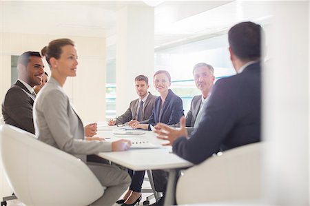 simsearch:6113-07588893,k - Business people meeting at conference table Stock Photo - Premium Royalty-Free, Code: 6113-07588901