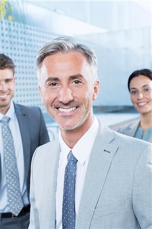 Portrait of confident business people outdoors Stock Photo - Premium Royalty-Free, Code: 6113-07588928