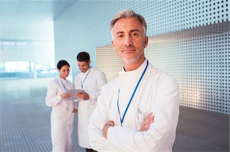 simsearch:6113-07589254,k - Portrait of confident doctor Stock Photo - Premium Royalty-Free, Code: 6113-07589067