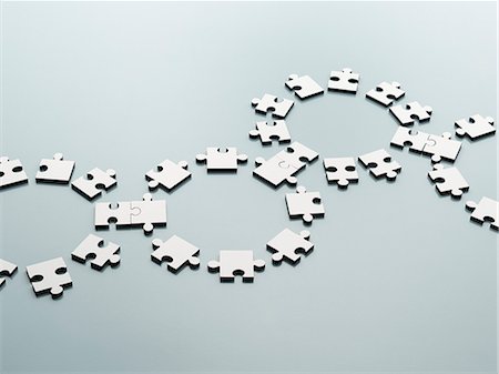 puzzles - Connected jigsaw pieces Stock Photo - Premium Royalty-Free, Code: 6113-07589122