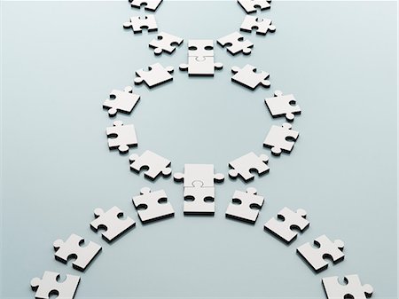 Connected jigsaw pieces Photographie de stock - Premium Libres de Droits, Code: 6113-07589124