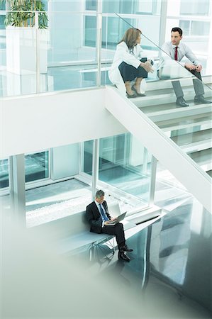 simsearch:6113-07589254,k - Doctor and administrator talking on hospital stairs Stock Photo - Premium Royalty-Free, Code: 6113-07589233