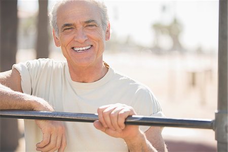 senior man exercising - Portrait of confident senior man outdoors Stock Photo - Premium Royalty-Free, Code: 6113-07589435
