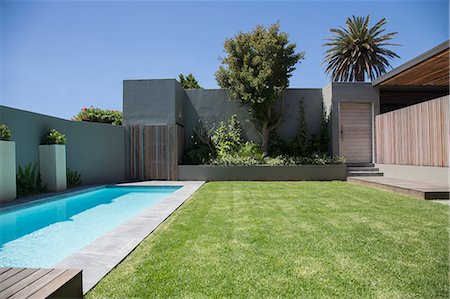 swimming pool in house - Modern lap pool in backyard Stock Photo - Premium Royalty-Free, Code: 6113-07589708