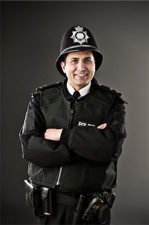 policemen - Portrait of confident policeman Stock Photo - Premium Royalty-Free, Code: 6113-07648751