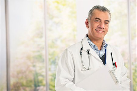 Portrait of confident doctor Stock Photo - Premium Royalty-Free, Code: 6113-07648736