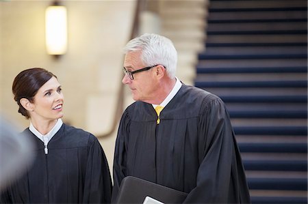 Judges talking in courthouse Stock Photo - Premium Royalty-Free, Code: 6113-07762365