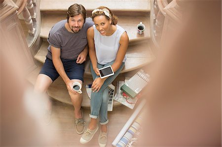 people picking coffee - Couple sitting on stairs together Stock Photo - Premium Royalty-Free, Code: 6113-07762308