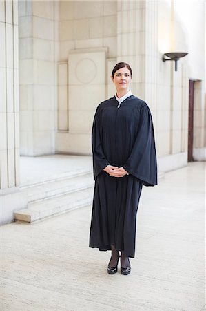 ruling - Judge standing in courthouse Photographie de stock - Premium Libres de Droits, Code: 6113-07762408