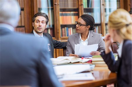 Lawyers talking in chambers Stock Photo - Premium Royalty-Free, Code: 6113-07762421