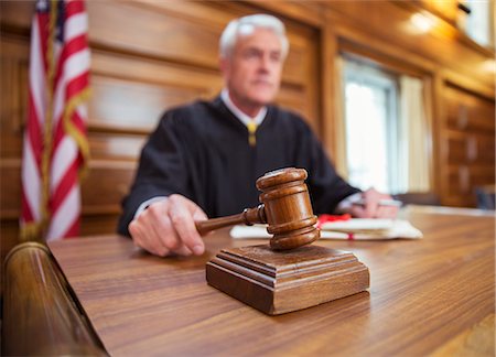 simsearch:6113-07762453,k - Judge holding gavel in court Stock Photo - Premium Royalty-Free, Code: 6113-07762431