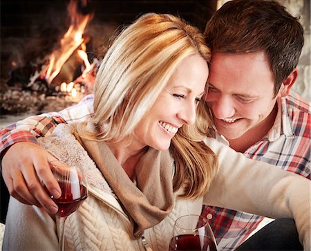 Couple enjoying drinks together Stock Photo - Premium Royalty-Free, Code: 6113-07790692