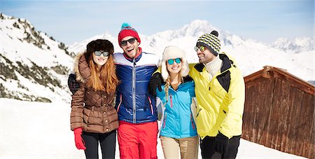 friendship travel adult - Friends hugging on mountain top Stock Photo - Premium Royalty-Free, Code: 6113-07790695