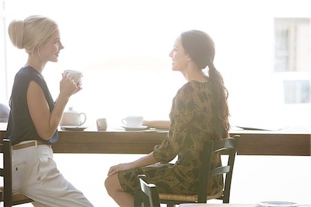 silhouette people window - Women having coffee together at cafe Stock Photo - Premium Royalty-Free, Code: 6113-07790843