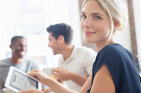 portrait, businessman - Businesswoman using digital tablet at meeting Stock Photo - Premium Royalty-Free, Code: 6113-07790910