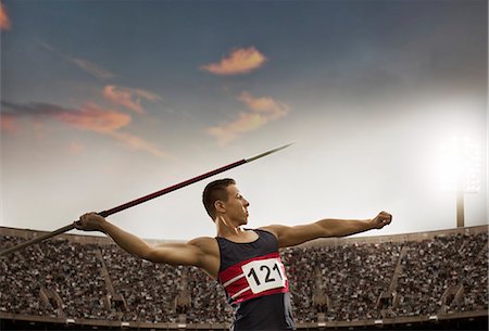 Track and field athlete throwing javelin Photographie de stock - Premium Libres de Droits, Code: 6113-07730472
