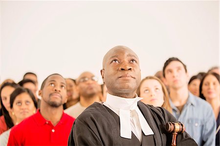 portrait concept - Judge and crowd looking up Stock Photo - Premium Royalty-Free, Code: 6113-07730641