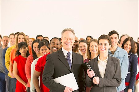 people crowd white background - Portrait of confident business people Stock Photo - Premium Royalty-Free, Code: 6113-07730642