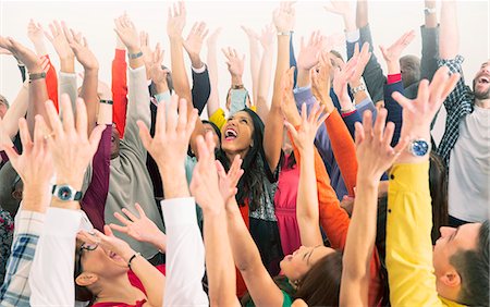 diversity women - Enthusiastic crowd cheering Stock Photo - Premium Royalty-Free, Code: 6113-07730648