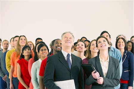 simsearch:6113-06753511,k - Crowd of business people looking up Stock Photo - Premium Royalty-Free, Code: 6113-07730673