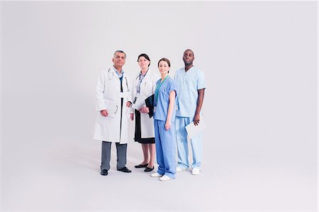 portrait and white background - Portrait of confident doctors and nurses Stock Photo - Premium Royalty-Free, Code: 6113-07730681