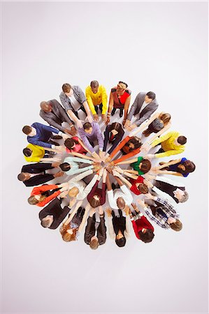 people circular - Business people touching hands in huddle Foto de stock - Sin royalties Premium, Código: 6113-07730691