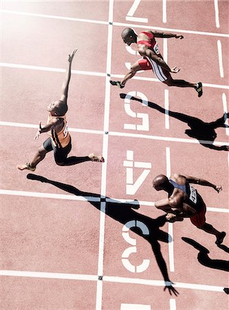 Runners crossing finish line Foto de stock - Sin royalties Premium, Código: 6113-07730606