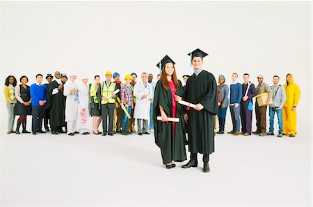 Portrait of confident graduates Stock Photo - Premium Royalty-Free, Code: 6113-07730625