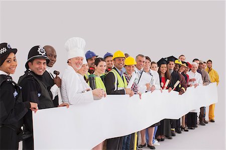 policemen - Portrait of diverse workforce with blank signs Stock Photo - Premium Royalty-Free, Code: 6113-07730702