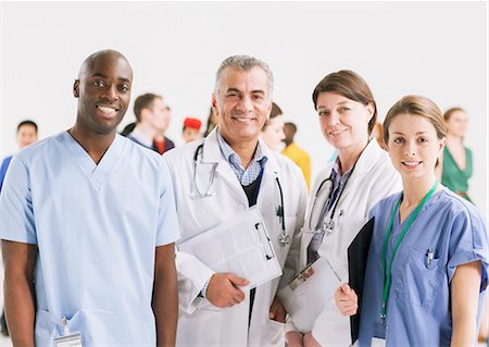 people crowd white background - Portrait of smiling doctors and nurses Stock Photo - Premium Royalty-Free, Code: 6113-07730712