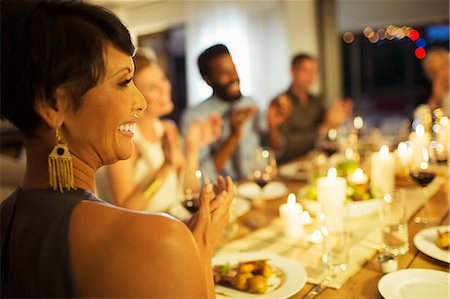 food and people - Friends applauding at dinner party Stock Photo - Premium Royalty-Free, Code: 6113-07730845