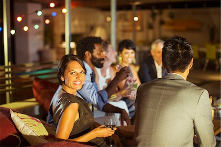 elegant man party - Friends relaxing together at party Stock Photo - Premium Royalty-Free, Code: 6113-07730839