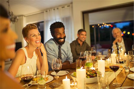 food for dinner - Friends laughing at dinner party Stock Photo - Premium Royalty-Free, Code: 6113-07730973