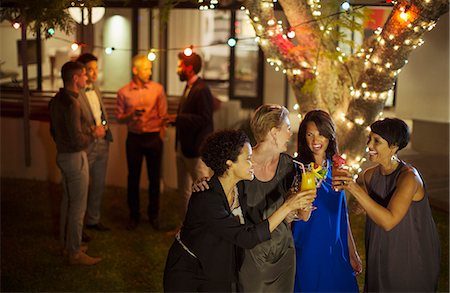 people outside partying - Friends toasting each other at party Stock Photo - Premium Royalty-Free, Code: 6113-07730997