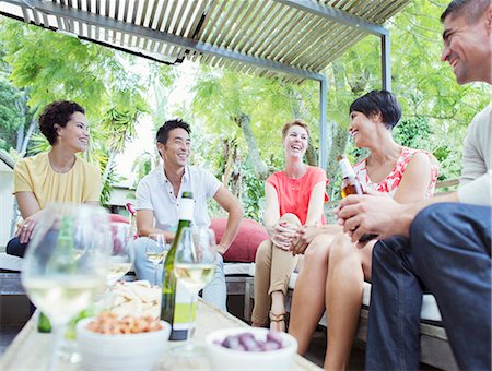 simsearch:6113-07731034,k - Friends talking at party Stock Photo - Premium Royalty-Free, Code: 6113-07730927