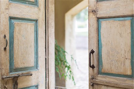 Close up of door and handles of rustic house Stock Photo - Premium Royalty-Free, Code: 6113-07731050