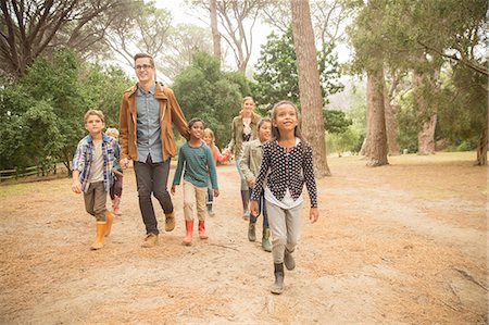 rain boots - Students and teachers walking outdoors Stock Photo - Premium Royalty-Free, Code: 6113-07731213