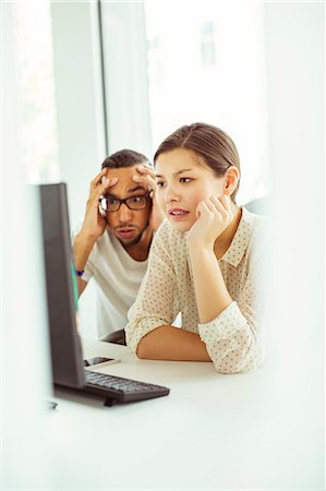 People working on computer in office Stock Photo - Premium Royalty-Free, Code: 6113-07731450