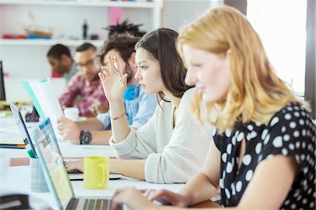 simsearch:6113-07731408,k - People working at conference table in office Stock Photo - Premium Royalty-Free, Code: 6113-07731401