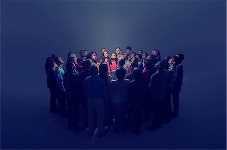 people and circle and above - Diverse crowd around bright light Stock Photo - Premium Royalty-Free, Code: 6113-07731696