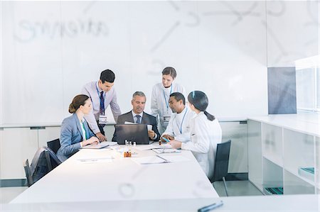 simsearch:693-07913191,k - Scientists and business people talking in conference room Stock Photo - Premium Royalty-Free, Code: 6113-07808466