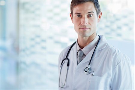 doctor portraits - Portrait of confident doctor wearing lab coat Stock Photo - Premium Royalty-Free, Code: 6113-07808655