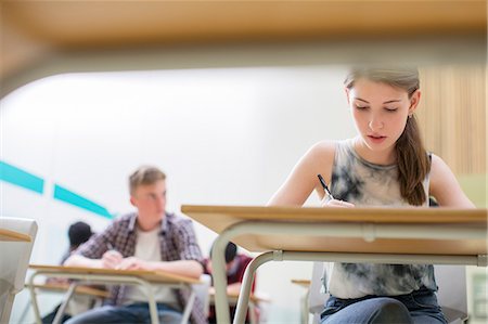 students at desk - Students writing their GCSE examination Stock Photo - Premium Royalty-Free, Code: 6113-07808738