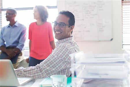 professionals with computers - Business people working in office Stock Photo - Premium Royalty-Free, Code: 6113-07808813