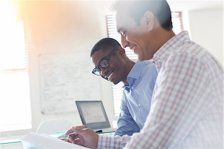 Businessmen working in office Photographie de stock - Premium Libres de Droits, Code: 6113-07808818