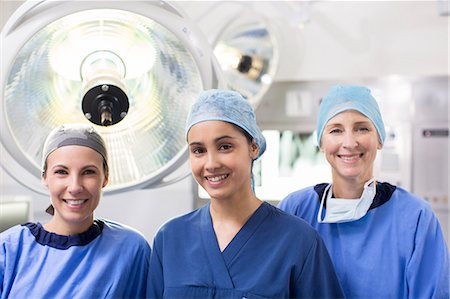 simsearch:6113-07905909,k - Portrait of three female surgeons in operating theater Stock Photo - Premium Royalty-Free, Code: 6113-07905967