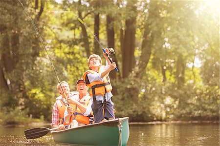 senior woods - Boy, father and grandfather fishing from canoe on lake Stock Photo - Premium Royalty-Free, Code: 6113-07906369