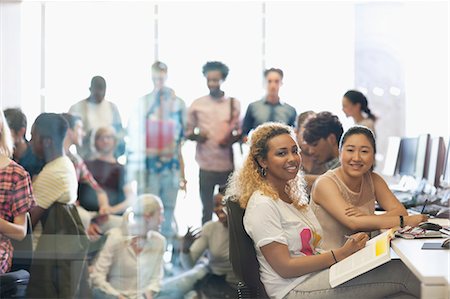 people desktop computer - Portrait of two female university students sitting at desk in technology classroom Stock Photo - Premium Royalty-Free, Code: 6113-07906477