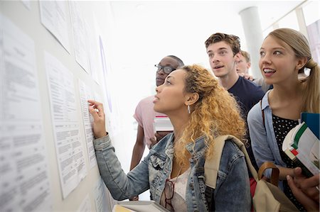 paper material - Group of students looking at information board and holding books at school Stock Photo - Premium Royalty-Free, Code: 6113-07906553
