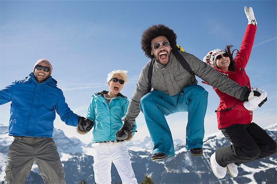 Portrait of exuberant friends in snow Photographie de stock - Premium Libres de Droits, Le code de l’image : 6113-07906578